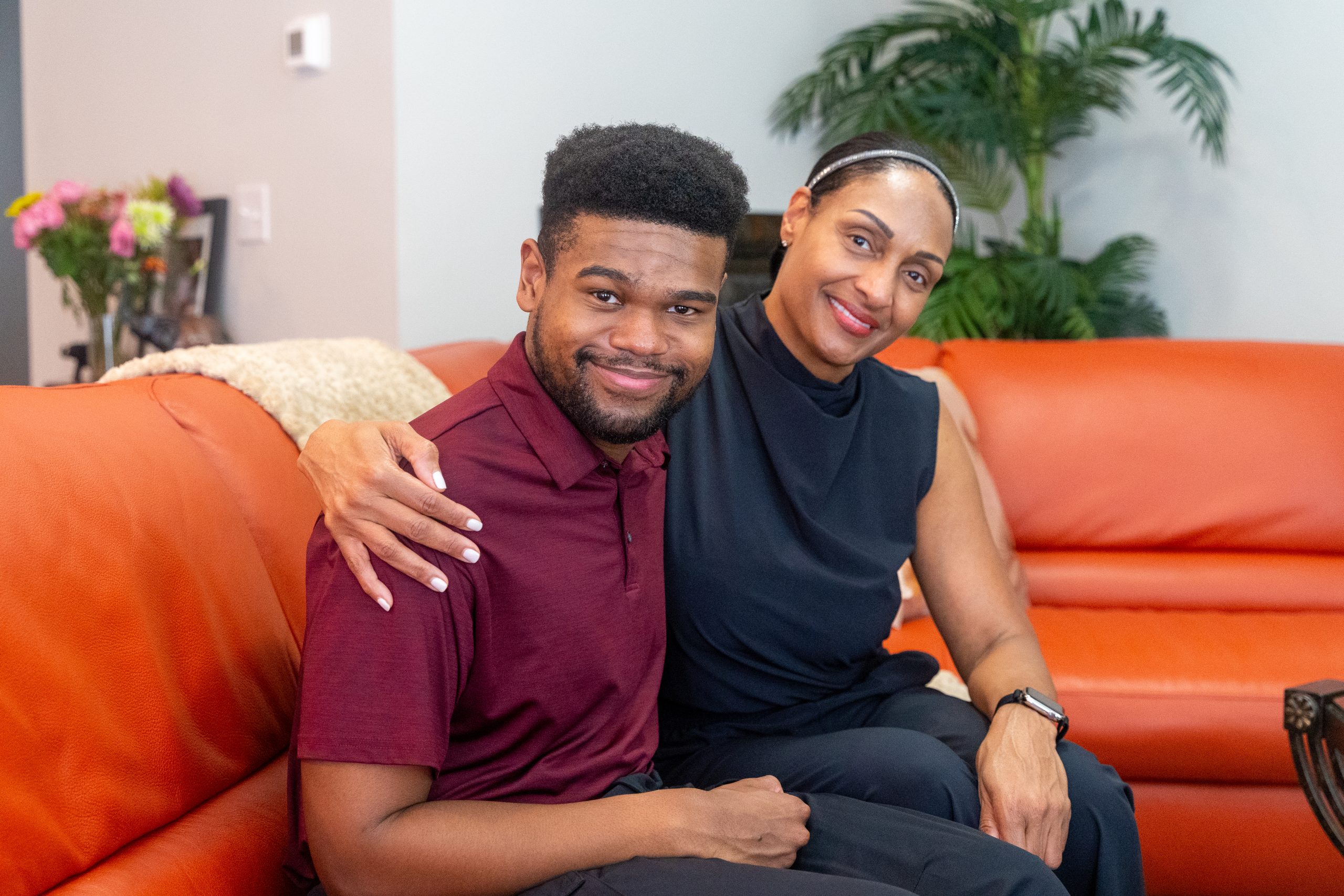 Justin, BDI service participant, and his mom, Kelly.